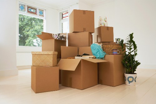 Removalist team transporting furniture in Storage Haringey